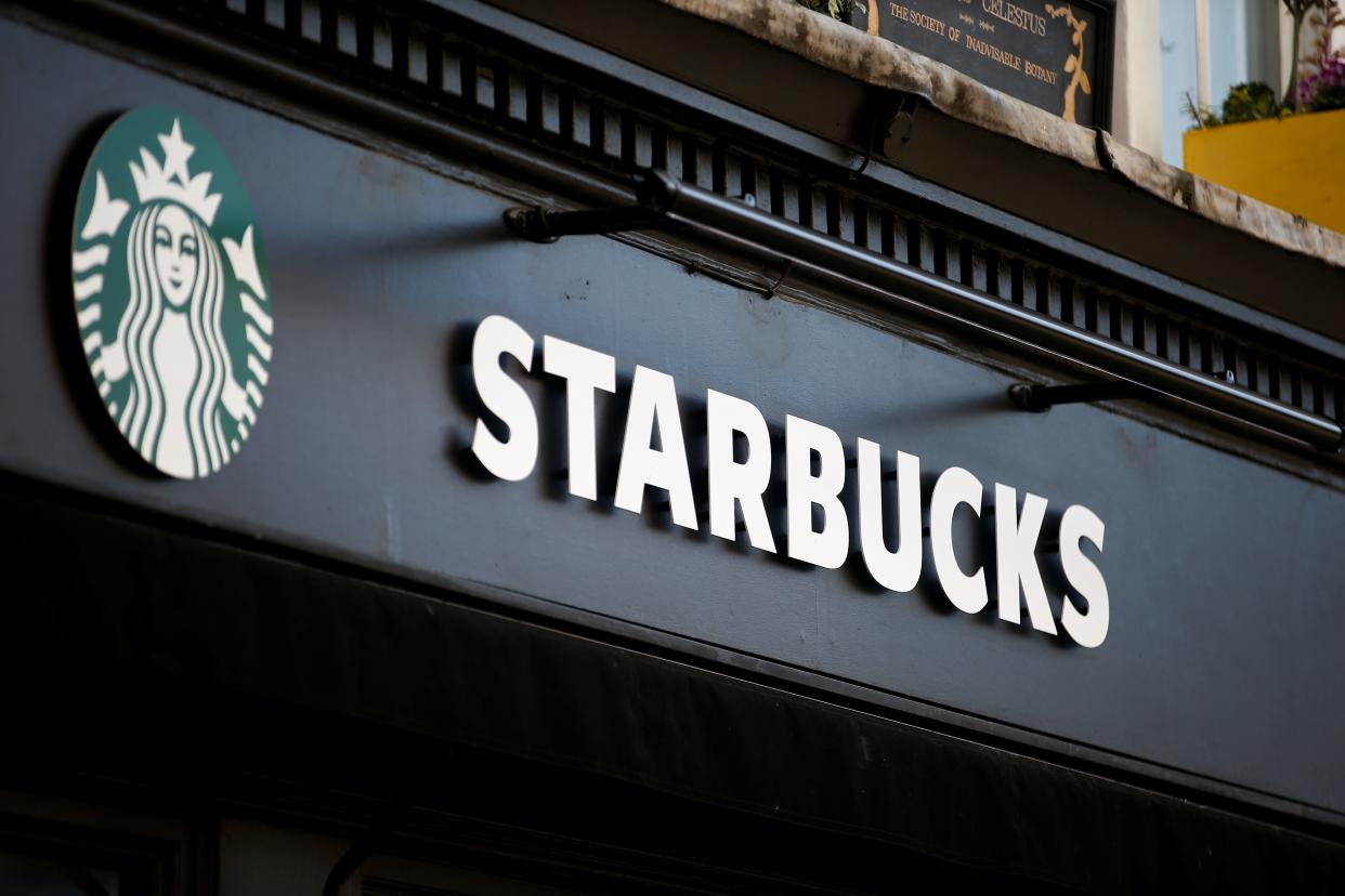 FILE PHOTO: General view of a Starbucks coffee shop in London, Britain, March 6, 2020. REUTERS/Henry Nicholls