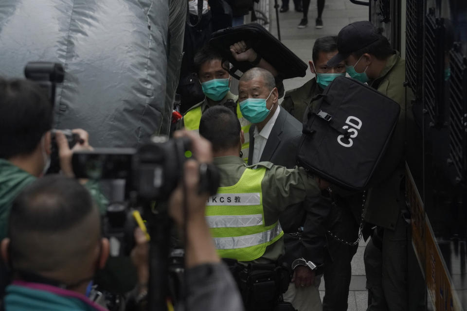 Democracy advocate Jimmy Lai, arrives at Hong Kong's Court of Final Appeal where the government is arguing against allowing him bail in Hong Kong Tuesday, Feb. 9, 2021. Prominent Hong Kong democracy advocate and newspaper founder Jimmy Lai returned to court to contest an attempt by the government to keep him in jail while facing charges under a sweeping new national security law.  (AP Photo/Kin Cheung)