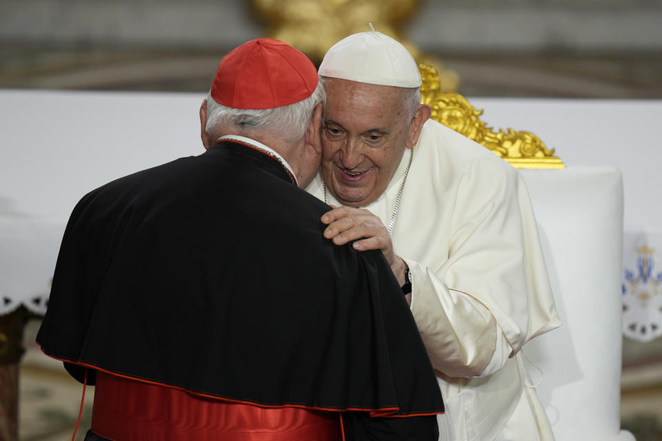 Pope Francis kisses Cardinal Jean Marc Aveline during a Marian prayer with the diocesan clergy at the Notre Dame de la Garde Basilica, in Marseille, France, Friday, Sept. 22, 2023. Francis, during a two-day visit, will join Catholic bishops from the Mediterranean region on discussions that will largely focus on migration. (AP Photo/Daniel Cole)