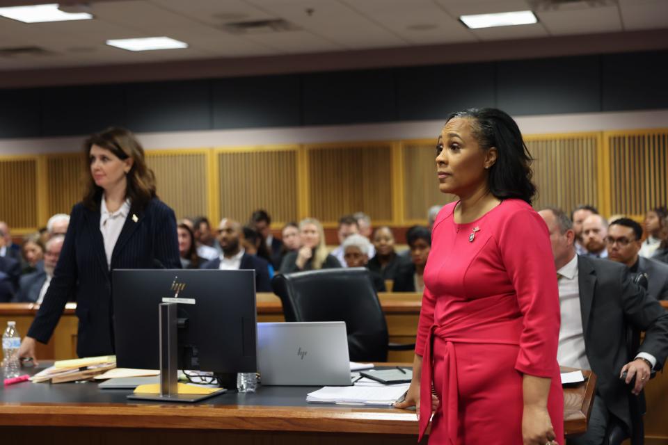 Attorney Fani Willis stands in the courtroom during a hearing in the case of State of Georgia v. Donald John Trump at the Fulton County Courthouse in Atlanta, Georgia, U.S., February 15, 2024.