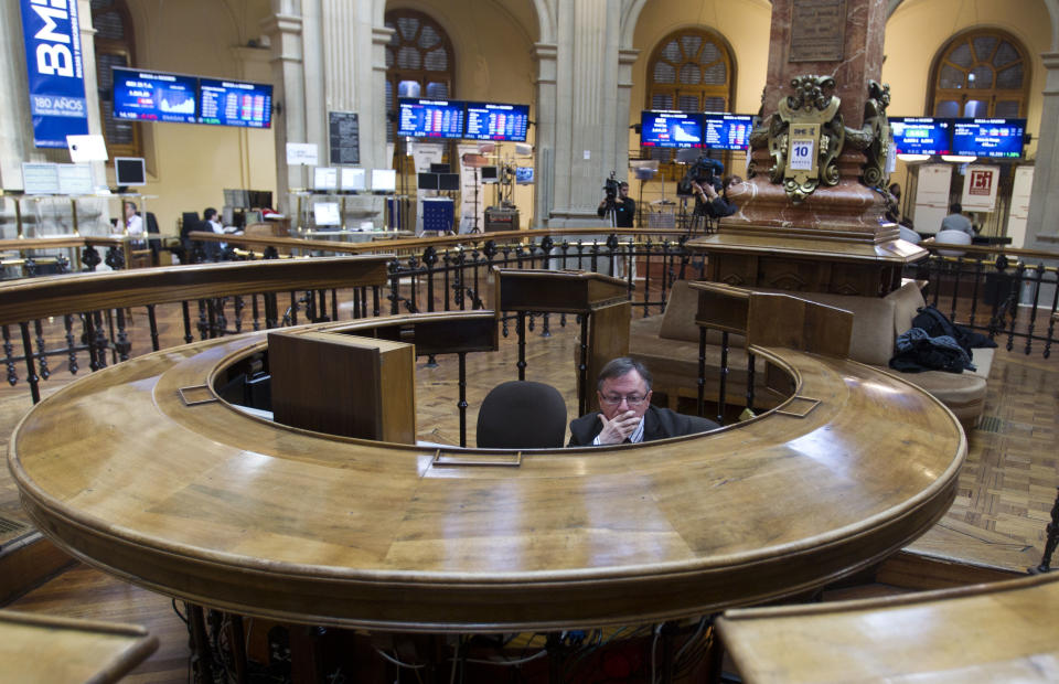 A broker sits in the stock exchange in Madrid Tuesday April 10, 2012.  Worries about Spain's finances intensified Tuesday, when the country's bond yields on international markets rose despite expectations of a new round of austerity measures. The Spanish government is under intense pressure to show it can rekindle economic growth and cut its budget deficit to avoid becoming the next eurozone country to need a bailout, while the joblessness rate is 23 percent and the economy is shrinking(AP Photo/Paul White)