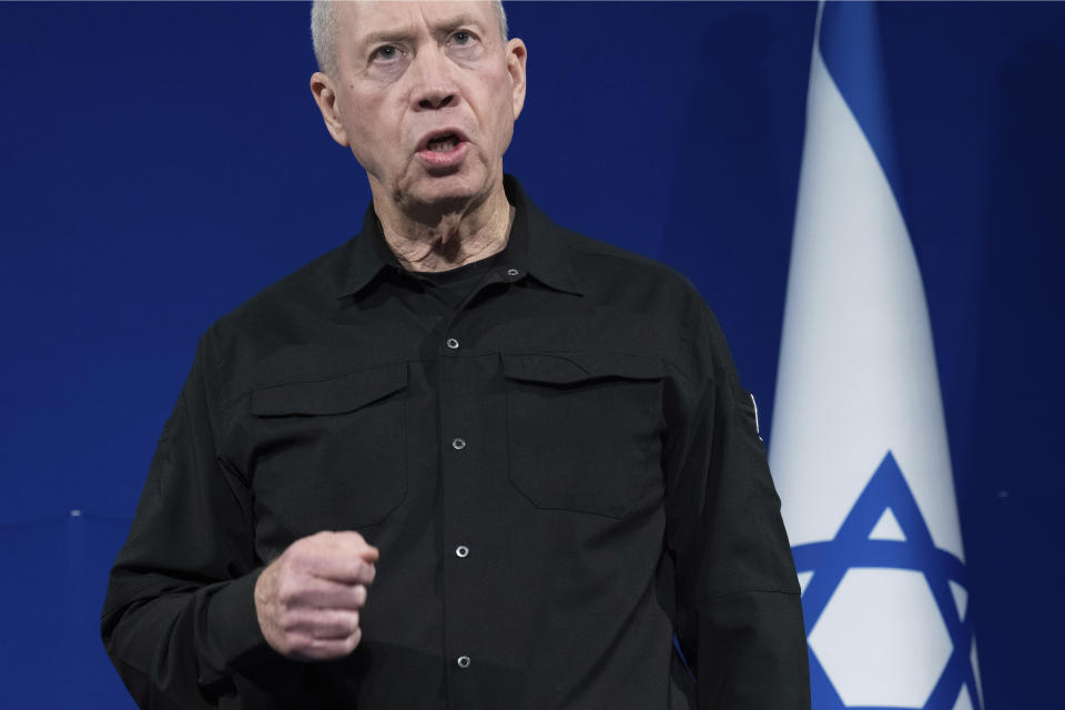 FILE - Israeli Defense Minister Yoav Gallant speaks to reporters prior to a meeting with U.S. Secretary of State Antony Blinken, not pictured, in Tel Aviv, Israel, Thursday, Nov. 30, 2023. On Monday, Dec. 11, Gallant pushed back against international calls to wrap up the country’s military offensive in the Gaza Strip, saying the current phase of the operation against the Hamas militant group will “take time.” (Saul Loeb/Pool Photo via AP, File)