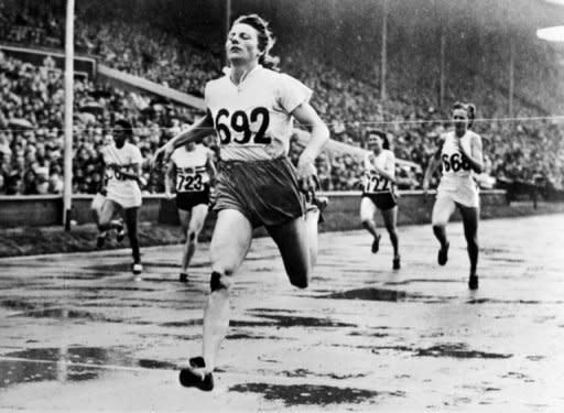 Dutch athlete Fanny Blankers-Koen crosses the finish line to win Olympic gold in the 200m at London's Wembley stadium in July 1948. London is the first city to host a third Olympic Games, but the modest Games of the last century were worlds away from today's glossy extravaganzas