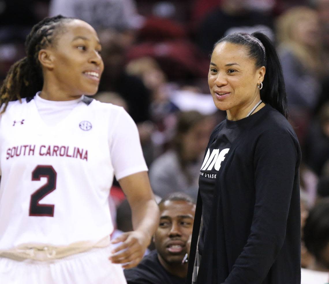 Coach Dawn Staley talks with South Carolina Gamecocks guard Olivia Gaines (2) during the first half of action in an exhibition game against Coker College on Nov. 2, 2014.