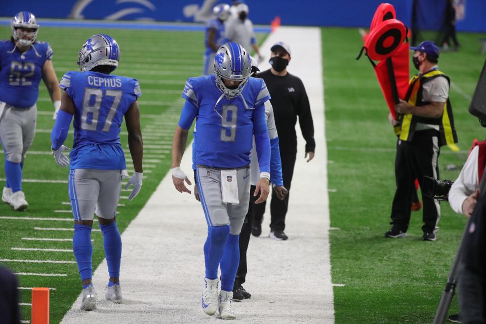 Lions quarterback Matthew Stafford walks off the field after the 37-35 loss to the Vikings at Ford Field on Sunday, January 3, 2021.