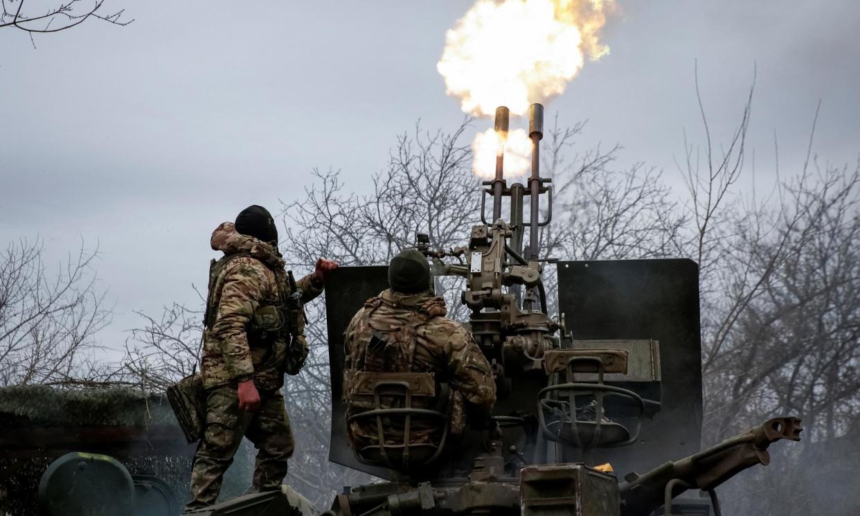 <span>Ukrainian service personnel fire an anti-aircraft cannon at a frontline near Bakhmut in March. </span><span>Photograph: RFE/RL/Serhii Nuzhnenko/Reuters</span>