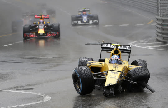 <p>Renault driver Jolyon Palmer of Britain steers his damaged car after crashing into a wall during the Formula One Grand Prix at the Monaco racetrack in Monaco, Sunday, May 29, 2016. <em>(AP Photo/Petr David Josek)</em> </p>