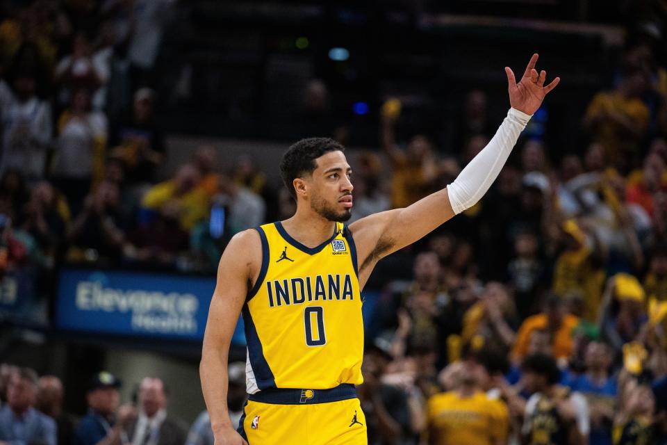 Apr 28, 2024; Indianapolis, Indiana, USA; Indiana Pacers guard Tyrese Haliburton (0) celebrates a made basket during game four of the first round for the 2024 NBA playoffs against the Milwaukee Bucks at Gainbridge Fieldhouse. Mandatory Credit: Trevor Ruszkowski-USA TODAY Sports