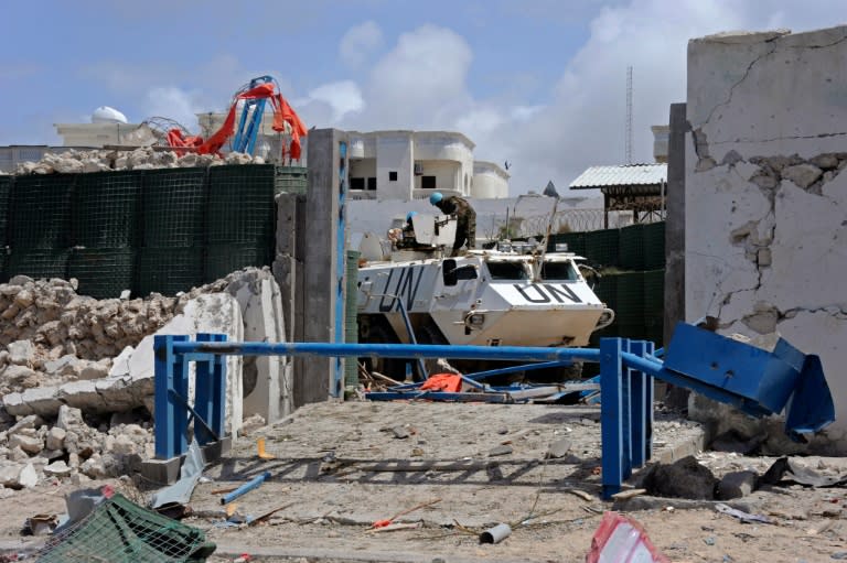 UN soldiers secure a perimeter wall following twin car bombings near UN and AU buildings in Mogadishu in July claimed by the jihadist Shabaab group