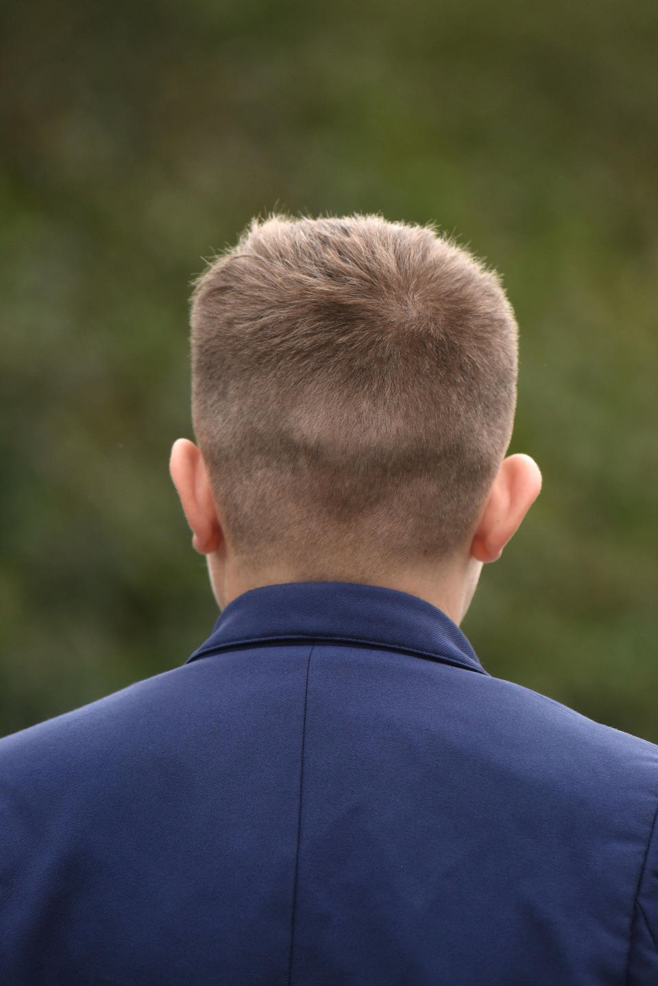 Jason's mum claims her son's short hair looks "smart". [Photo: SWNS]