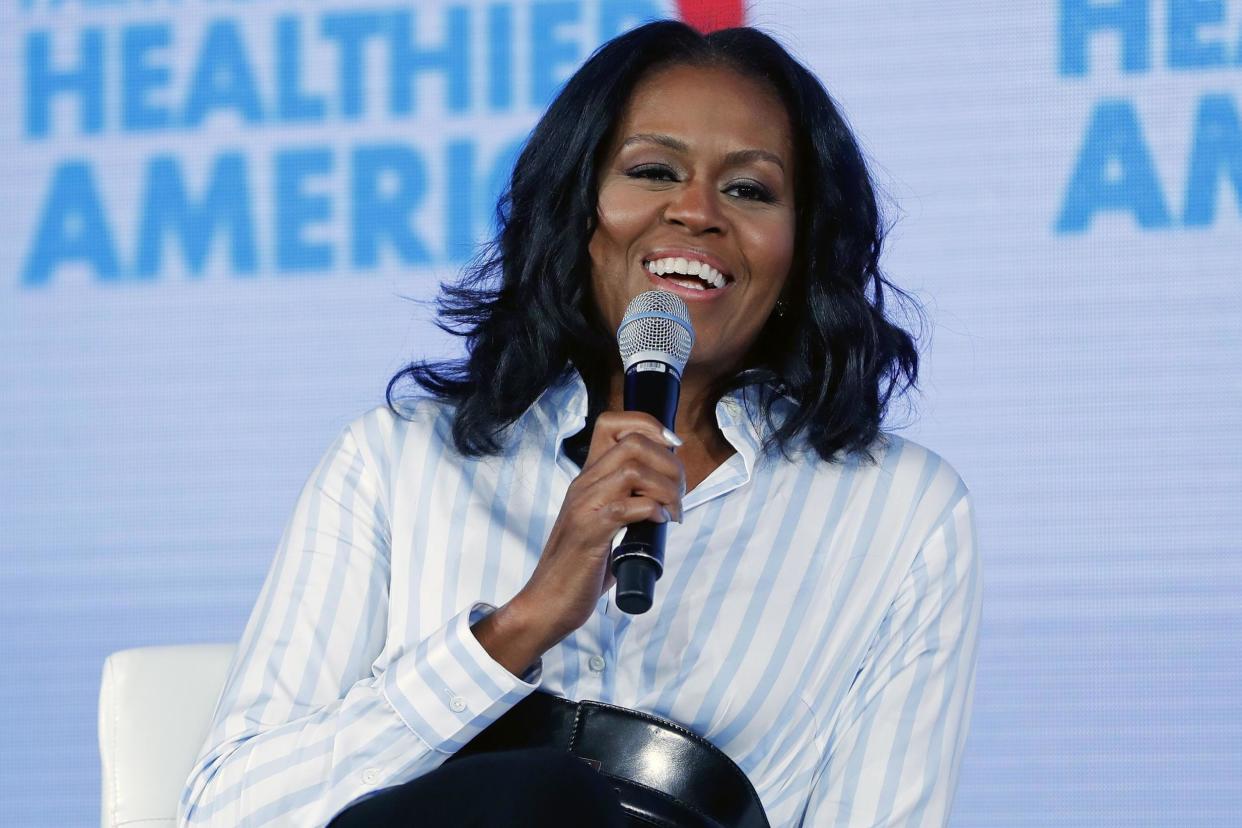 In support: Michelle Obama has praised Black Panther: AP