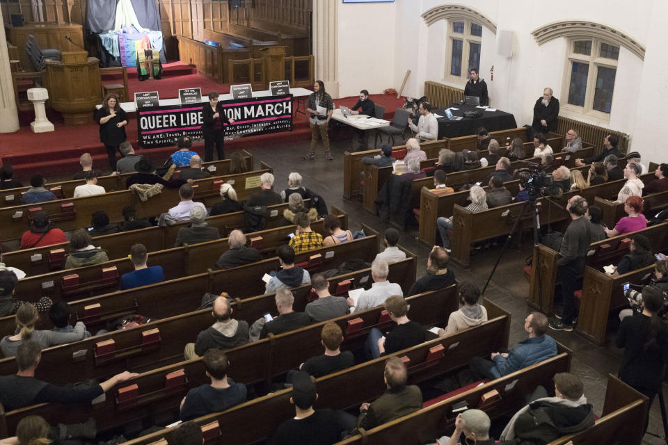 In this March 27, 2019, photo, activist Natalie James speaks during a meeting of the Reclaim Pride Coalition at the Church of the Village in New York. Activists who believe New York City’s annual LGBTQ Pride march has become too commercialized are staging an alternative march the same day. The two marches through Manhattan streets will take place Sunday, June 30, the last day of a month of celebrations marking the 50th anniversary of the 1969 Stonewall uprising. (AP Photo/Mary Altaffer)