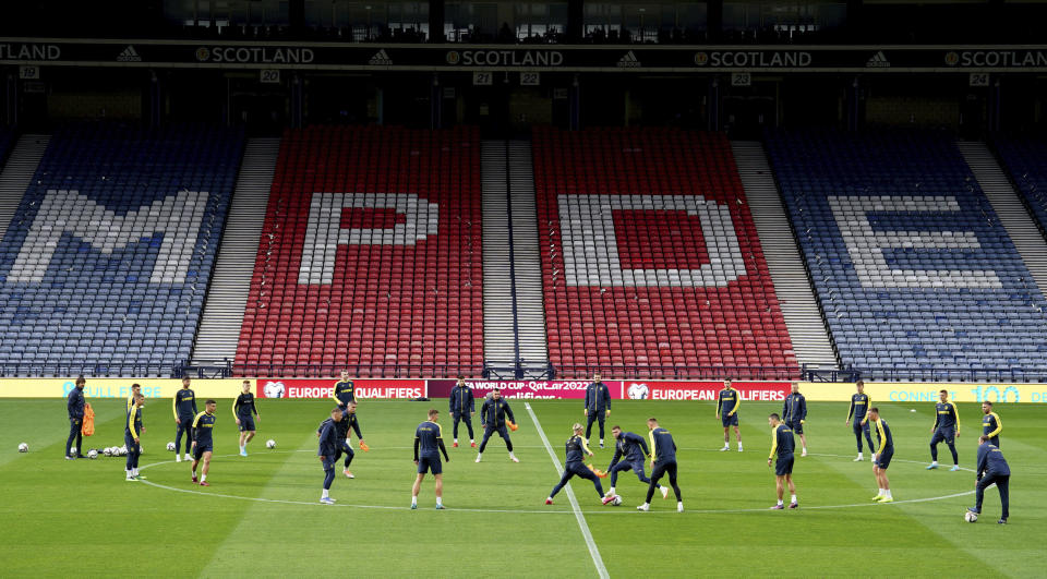 Ukraine players take part in a training session, at Hampden Park, in Glasgow, Scotland, Tuesday May 31, 2022. Scotland will play Ukraine in a World Cup qualifier soccer match on Wednesday. (Andrew Milligan/PA via AP)