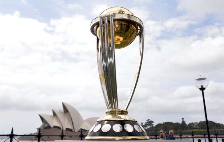 The Cricket World Cup trophy is seen in front of the Australia's iconic landmark Opera House