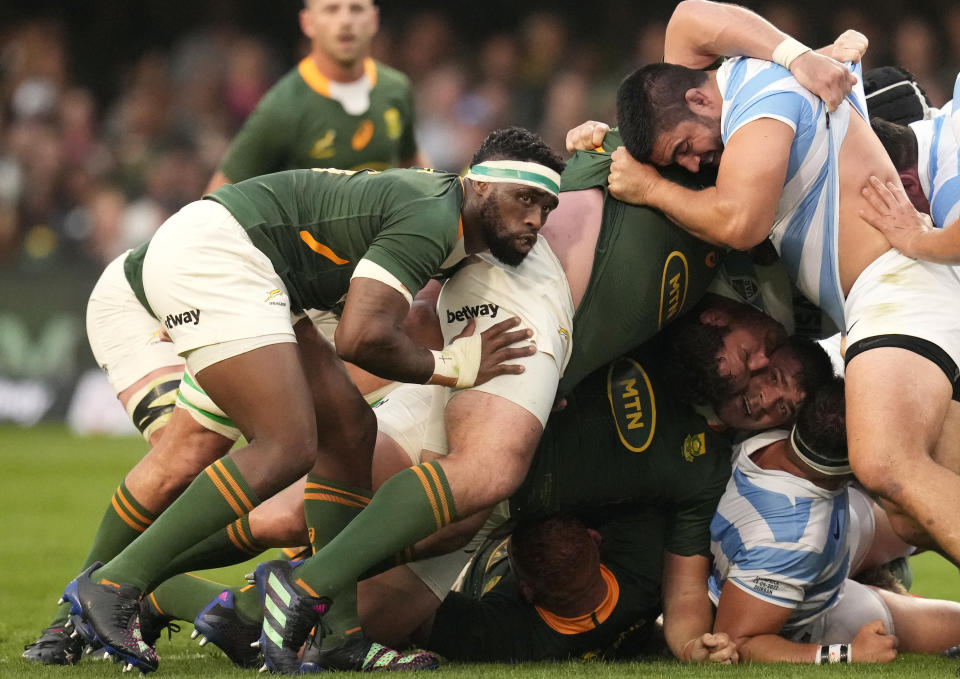 FILE - South Africa's captain Siya Kolisi, left, with teammates scrum during the Rugby Championship test between South Africa and Argentina at Kings Park Stadium in Durban, South Africa, on Sept. 24, 2022. This Rugby World Cup was always the ultimate goal for the Springboks coaching combination of Rassie Erasmus and Jacques Nienaber, who sat down soon after taking over a struggling team in early 2018 and began plotting a five-year plan to build a squad for France 2023. (AP Photo/Themba Hadebe, File)