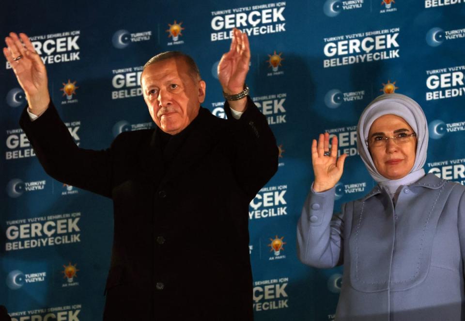 Turkish President Recep Tayyip Erdogan and his wife Emine Erdogan wave to their supporters in Ankara (AFP via Getty Images)