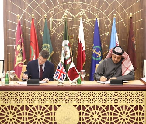 Defence Secretary Gavin Williamson and Minister of State for Defense of Qatar Khalid bin Mohammad Al Attiyah sign an agreement on the sale of Typhoon - Credit: Anadoulo