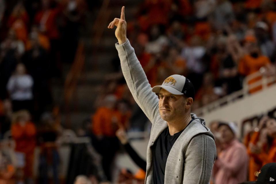 Oklahoma State alumni Doug Gottlieb is acknowledged during the second half of the NCAA college basketball game against Oklahoma in Stillwater, Okla., Wednesday, Jan. 18, 2023. (AP Photo/Mitch Alcala)