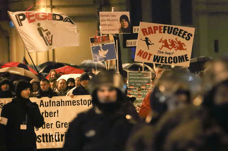 Members of LEGIDA, the Leipzig arm of the anti-Islam movement PEGIDA, take part in a rally in Leipzig, Germany January 11, 2016. REUTERS/Fabrizio Bensch