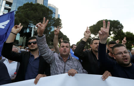 Supporters of the opposition party attend an anti-government protest in front of Prime Minister Edi Rama's office in Tirana, Albania, May 25, 2019. REUTERS/Florion Goga