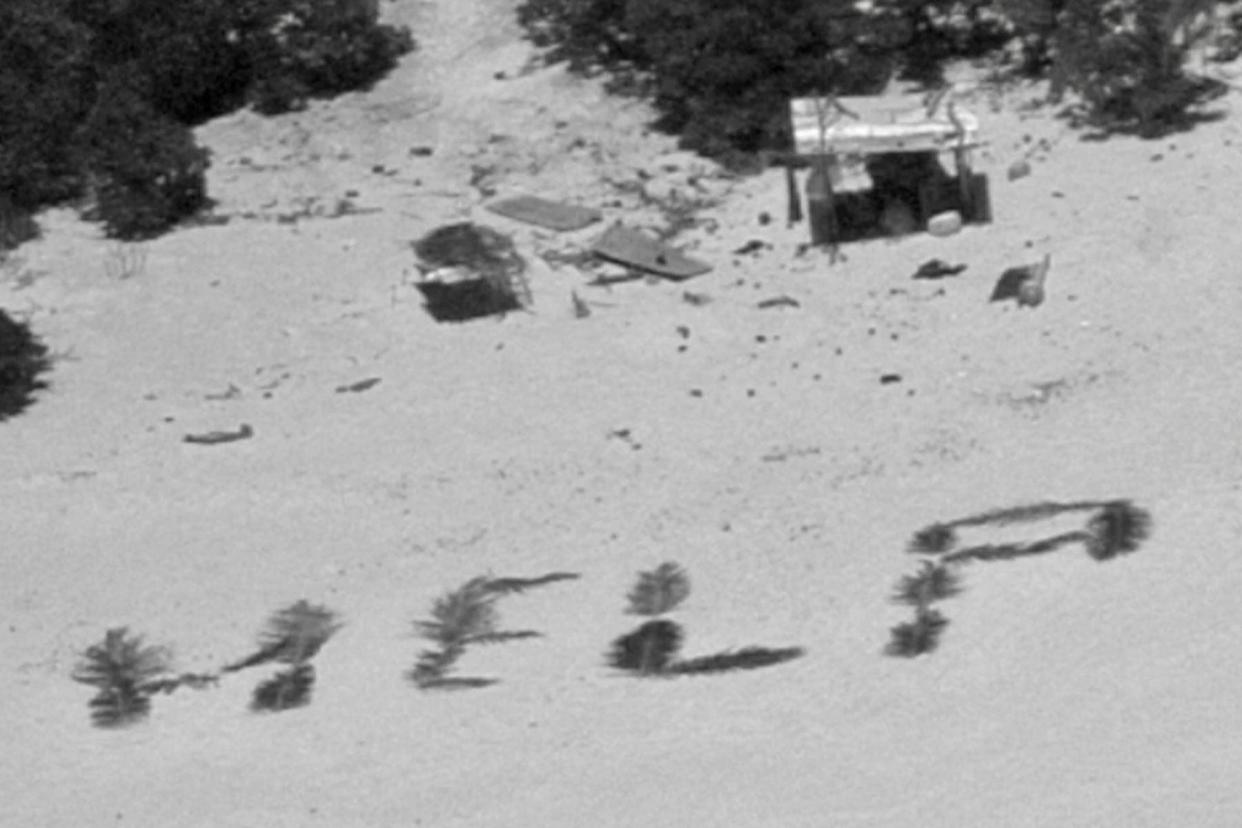 A distress sign made by fisherman on a remote island near Guam.