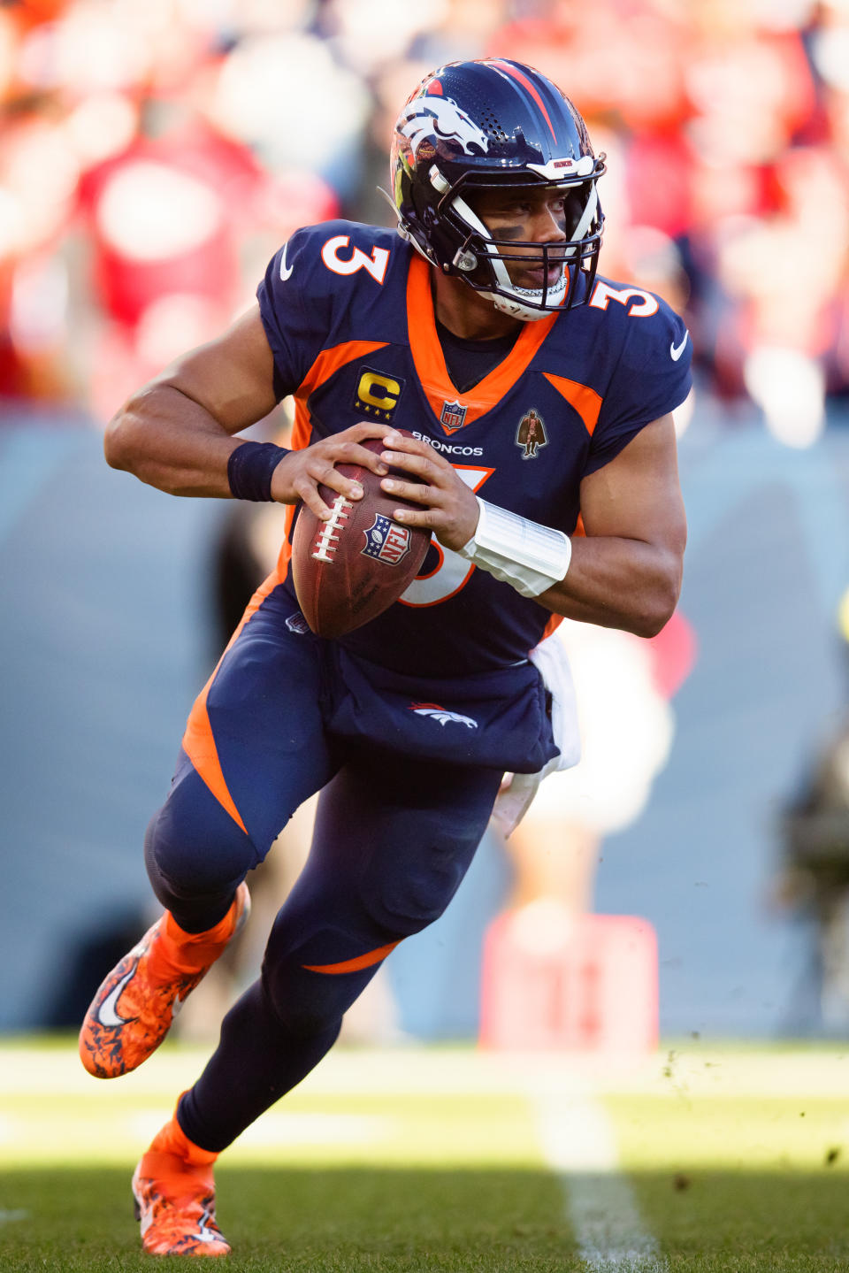 Russell Wilson Playing Football For Denver Broncos