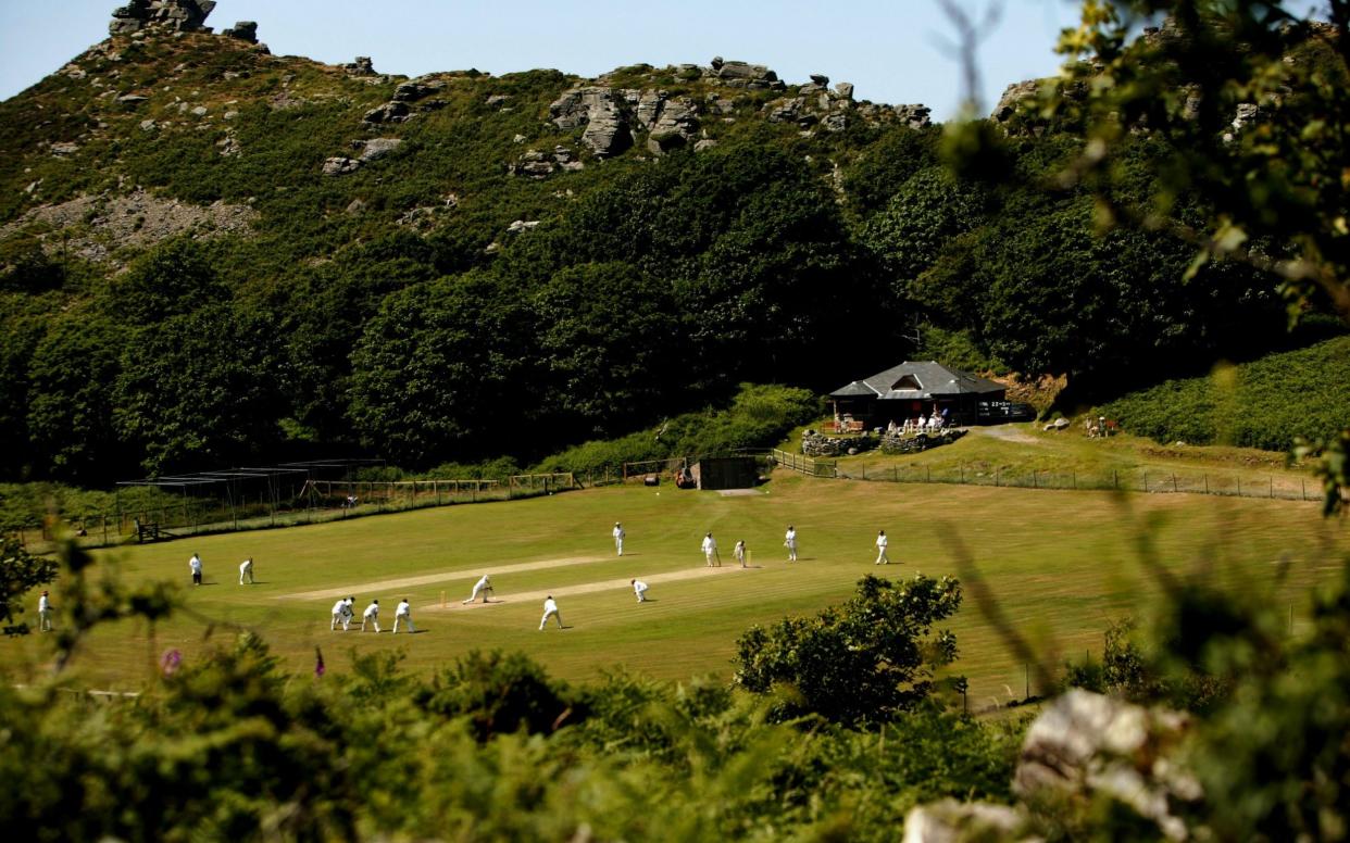 Cricketers from Lynton and Lynmouth Cricket Club playing in the 'Valley of The Rocks' - GETTY IMAGES