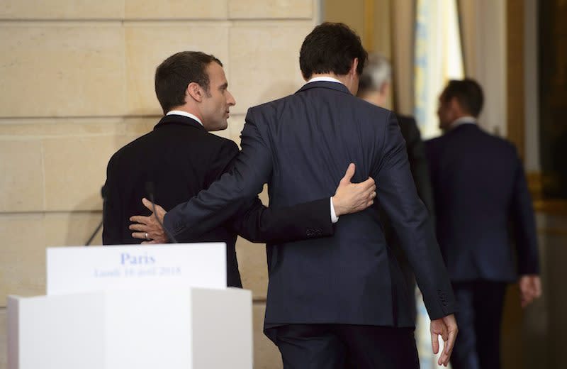 PHOTOS: Justin Trudeau meets with leaders in Lima, Paris and London