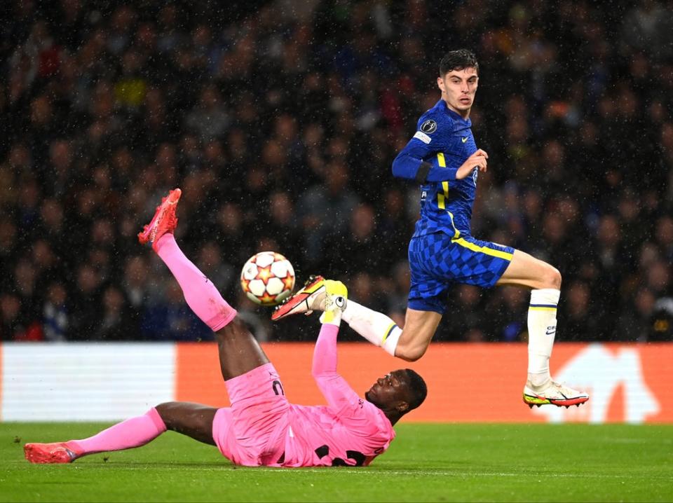 Kai Havertz lifts a clever finish over Ismael Diawara (Chelsea FC via Getty Images)