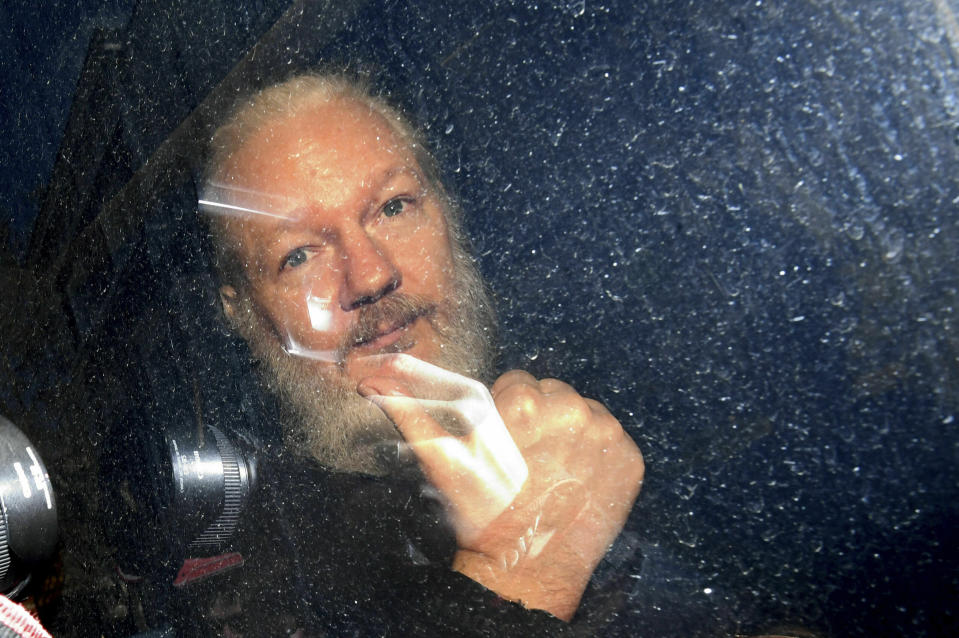 Julian Assange arrives at Westminster Magistrates' Court in London after being taken into custody, April 11, 2019. (Photo: Victoria Jones/PA via AP)