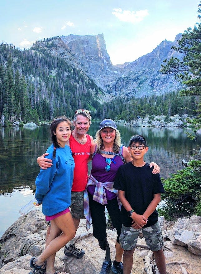 Chris Prange-Morgan poses with her family.