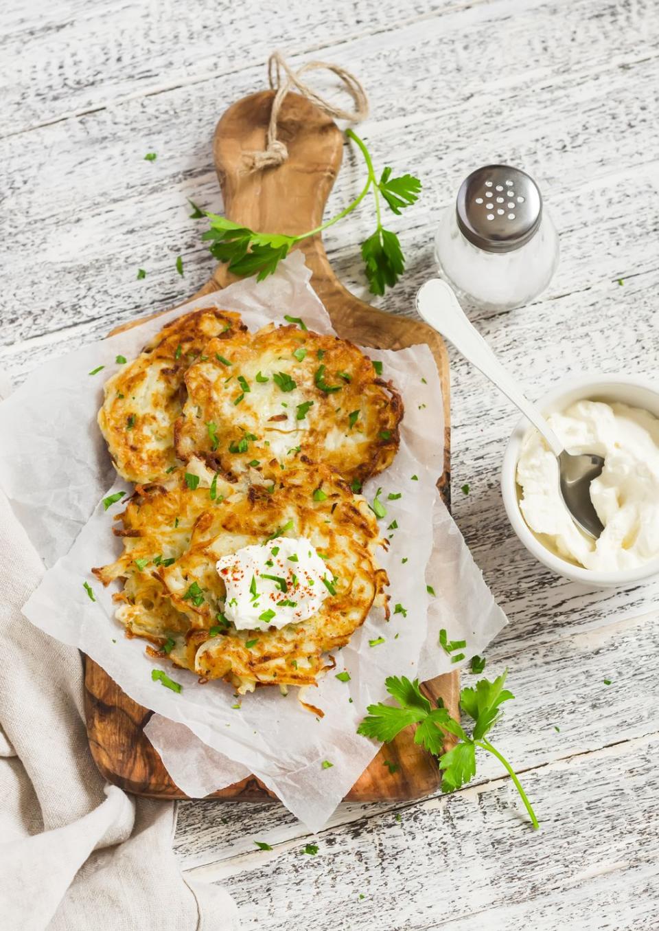 8) Traditional Hanukkah foods involve latkes.