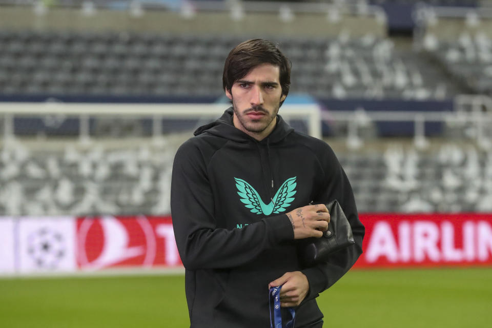 FILE - Newcastle's Sandro Tonali walks on the field prior the Champions League group F soccer match between Newcastle and Dortmund at St. James' Park, in Newcastle, England, Wednesday, Oct. 25, 2023. The most feared striker in Europe won’t be playing at the European Championship. That’s because Erling Haaland’s Norway didn’t qualify. Other big names missing from the Euros include Karim Benzema, Marcus Rashford, Mats Hummels and Sandro Tonali. (AP Photo/Scott Heppell, File)