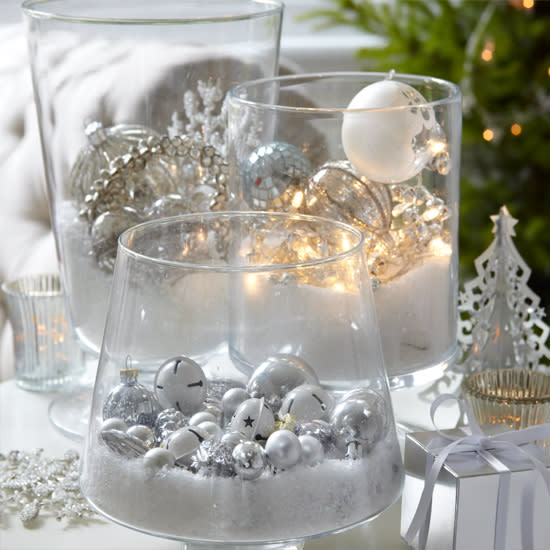 Fill vases with metallic baubles for a chic look.