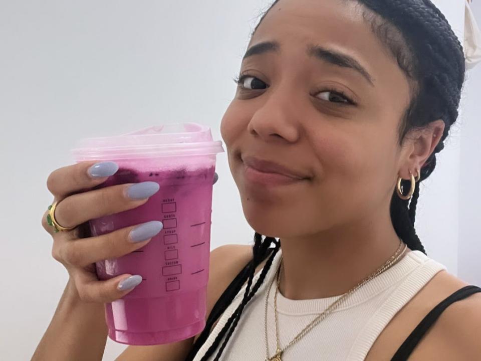 Pauline Villegas trying the Taylor Swift lavender haze secret menu drink