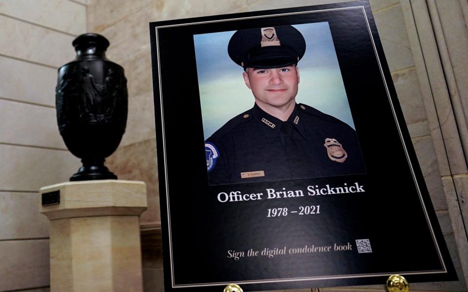 Brian Sicknick died after being pepper-sprayed and hit with a fire-extinguisher during the riot, below