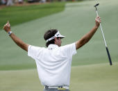 Bubba Watson celebrates after a birdie on the 14th green during the second round of the Masters golf tournament Friday, April 11, 2014, in Augusta, Ga. (AP Photo/Matt Slocum)