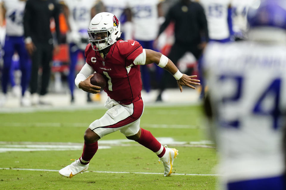 Arizona Cardinals quarterback Kyler Murray (1) runs for a touchdown against the Minnesota Vikings during the first half of an NFL football game, Sunday, Sept. 19, 2021, in Glendale, Ariz. (AP Photo/Ross D. Franklin)