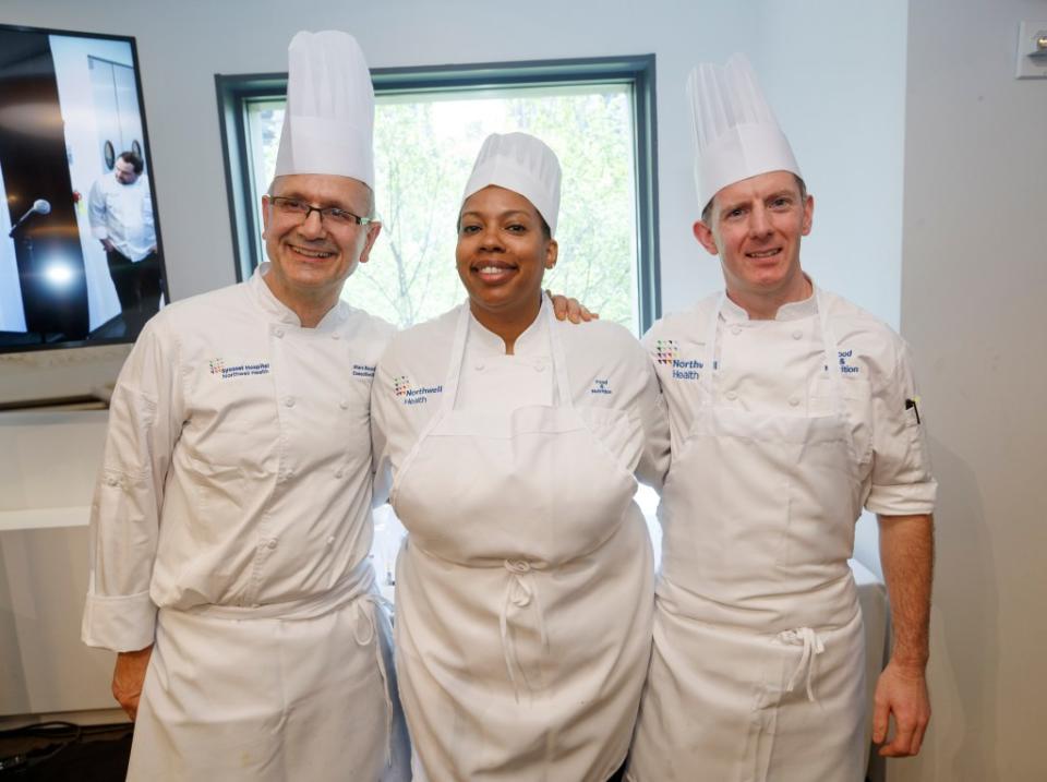 Chefs Marc Bauer (from left), Kelly Walker and Andrew Bennett take a break from cooking for a picture. Tamara Beckwith