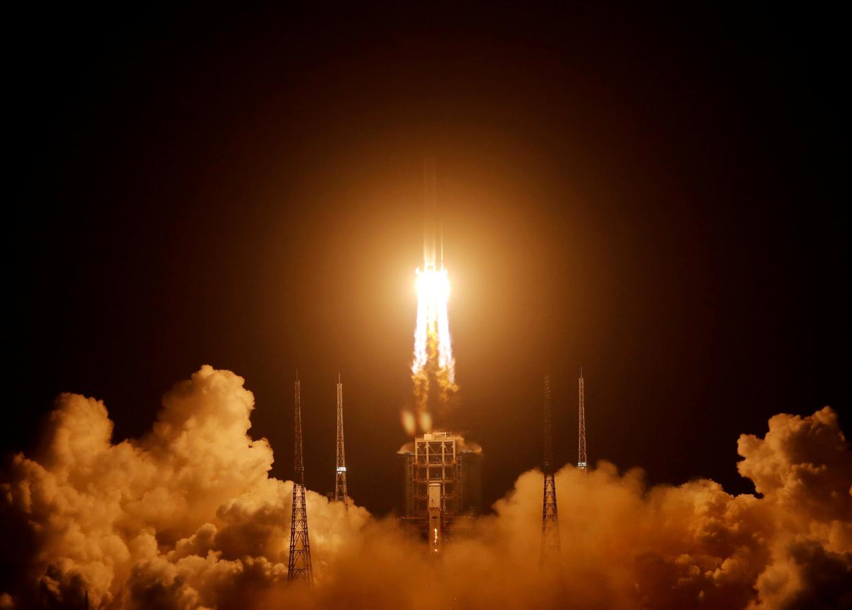 <p>The Long March-5 Y5 rocket, carrying the Chang'e-5 lunar probe, takes off from Wenchang Space Launch Center, in Wenchang</p> (REUTERS)