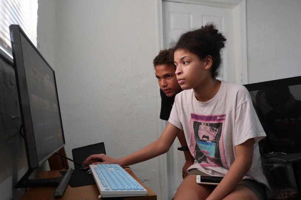 Samadhi Pacheco Ruiz and her brother search the internet for music. K-Pop is a favorite in the household.