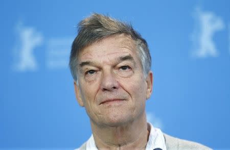 Director Benoit Jacquo poses during a photocall to promote the movie 'Journal d'une femme de chambre' ('Diary of Chambermaid') at the 65th Berlinale International Film Festival, in Berlin February 7, 2015. REUTERS/Hannibal Hanschke