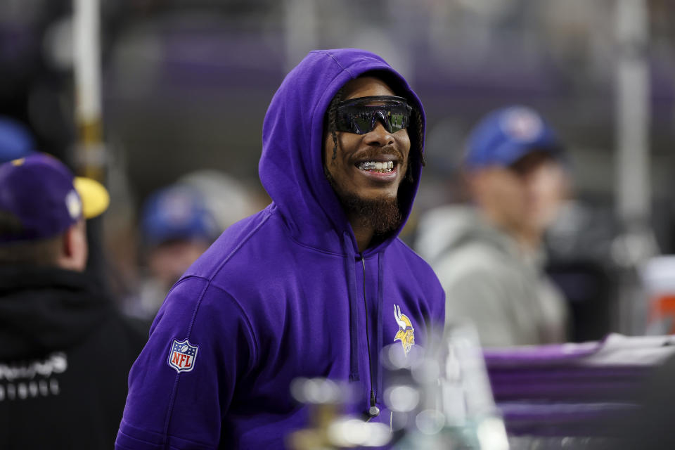 FILE - Minnesota Vikings wide receiver Justin Jefferson reacts from the sideline during the first half of an NFL football game against the San Francisco 49ers, Oct. 23, 2023, in Minneapolis. The Vikings designated wide receiver Jefferson for return from injured reserve Wednesday, Nov. 8, bringing the 2022 NFL Offensive Player of the Year back to practice with three weeks to assess the readiness of his strained right hamstring for game action. (AP Photo/Stacy Bengs, File)