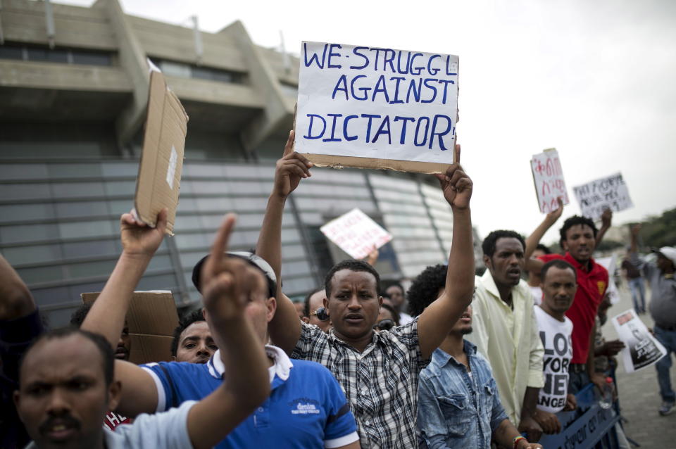 Eritrean refugees protest against the Eritrean government outside the nation's embassy in Tel Aviv, Israel, in 2015. (Photo: Baz Ratner / Reuters)