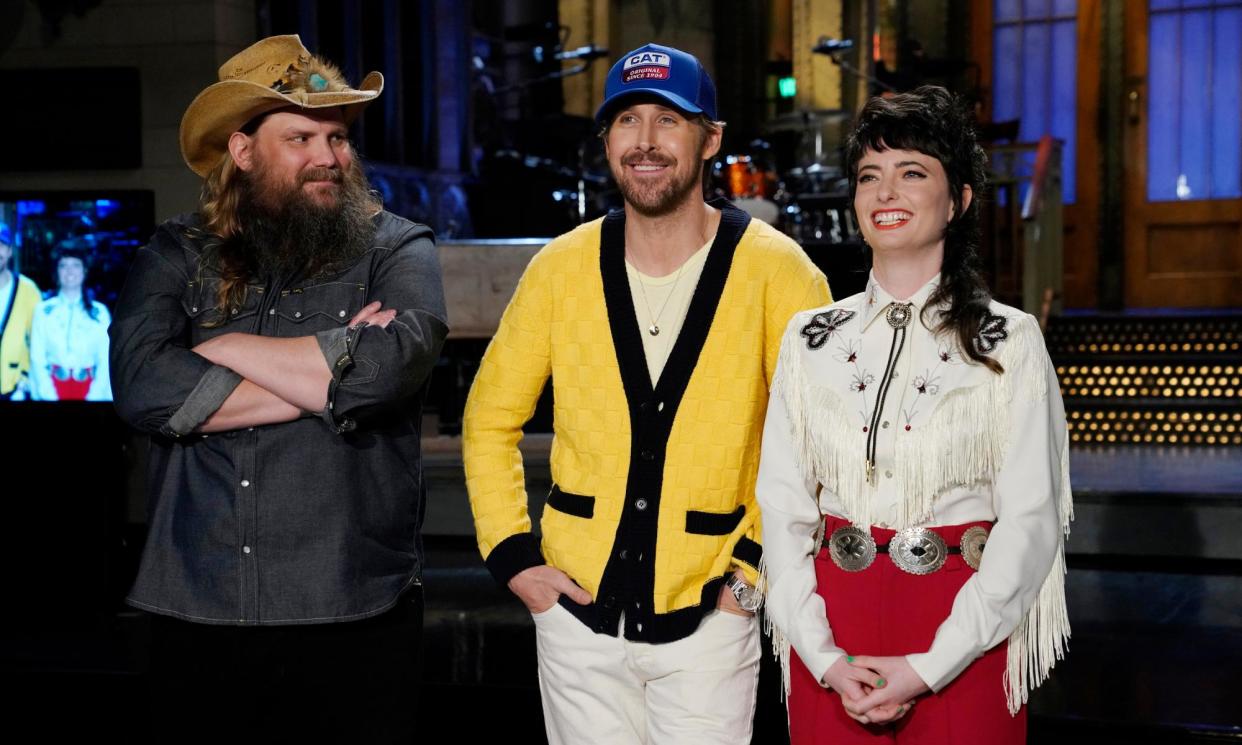 <span>Chris Stapleton, Ryan Gosling and Sarah Sherman.</span><span>Photograph: NBC/Rosalind O'Connor/Getty Images</span>