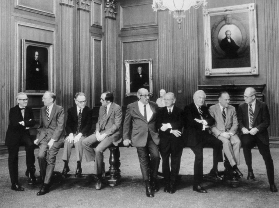 In 1977, the U.S. Supreme Court posed for what was believed to be the first casual portrait of the entire court. At left: Associate Justice John Paul Stevens. | Bettmann Archive/Getty Images