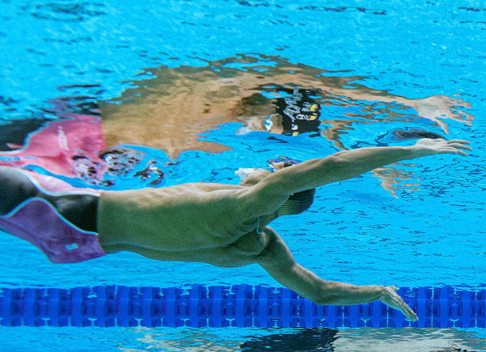 <p>Spain's Hugo Gonzalez has a moment of reflection during the men's 100m backstroke swimming event on July 25. </p>