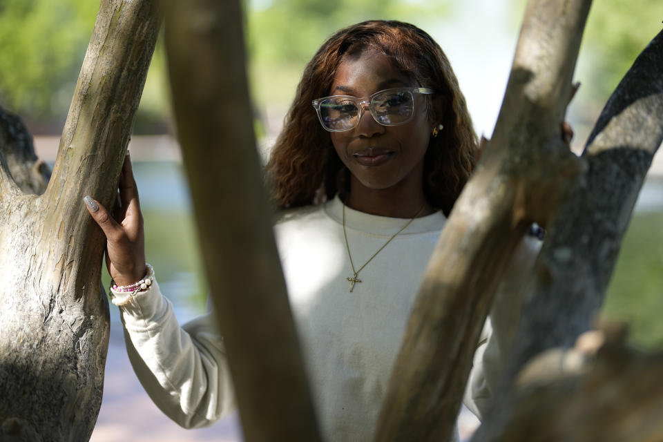 Courtney McClain, 22, a recent graduate of the University of South Carolina poses for a picture on campus on Monday, May 1, 2023, in Columbia, S.C. Black voters in South Carolina rescued Joe Biden’s bid for the presidency during the 2020 Democratic primary, and he rewarded them by moving the state to the head of the party’s nominating schedule. But two years into his presidency, interviews with more than a dozen Black voters representing a variety of ages and backgrounds reveal mixed views, especially between generations. (AP Photo/Chris Carlson)