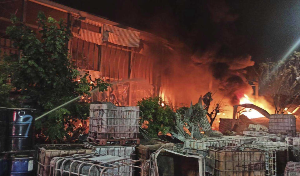 This image provided by the Pingtung County Government shows a factory fire at golf ball manufacturer Launch Technologies Co. in the southern county of Pingtung in Taiwan on Friday, Sept. 22, 2023. The factory fire has left multiple people killed, and the victims include several firefighters, according to Taiwanese media reports. (Pingtung County Government via AP)