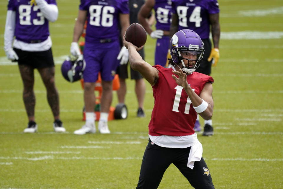 Rookie Minnesota Viking quarterback Kellen Mond throws a pass during NFL football practice in Eagan, Minn., Wednesday, June 2, 2021.(AP Photo/Jim Mone)